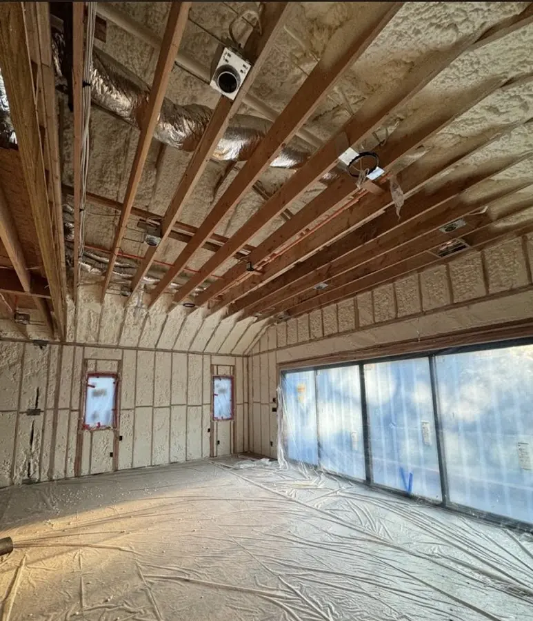Interior walls and ceiling insulated with spray foam during new construction in Albemarle